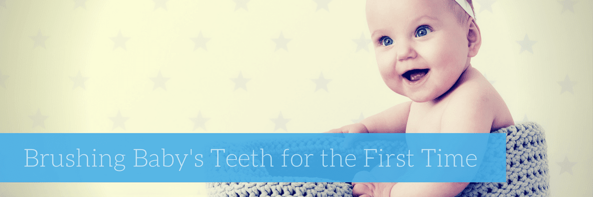 brushing baby's mouth for the first time